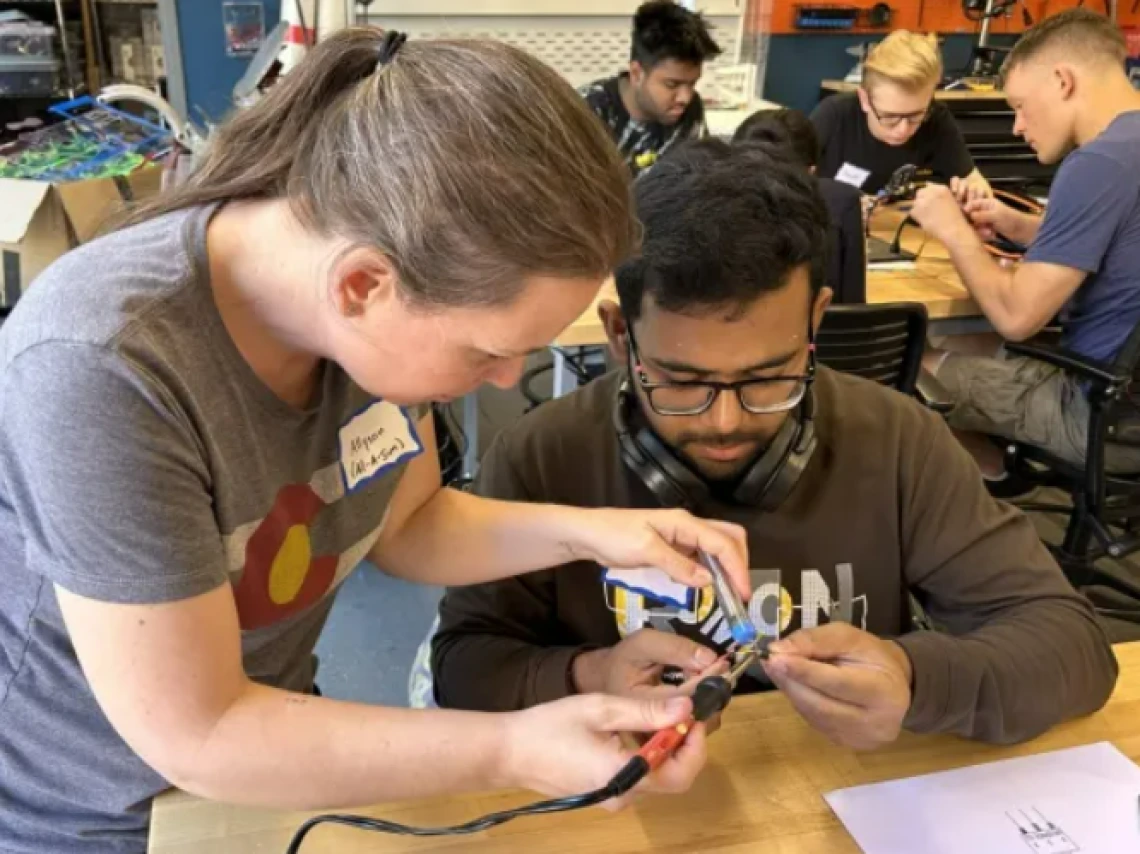Two students working on a project together.