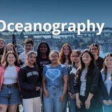 A group of smiling students stands in front of a natural waterway with a bridge and blue sky spanning the background behind them.  The image reads "Data Science in Oceanography"